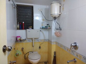Bathroom in 1 BHK Apartment at Ahimsa Niketan CHS, Malad West – for Sale