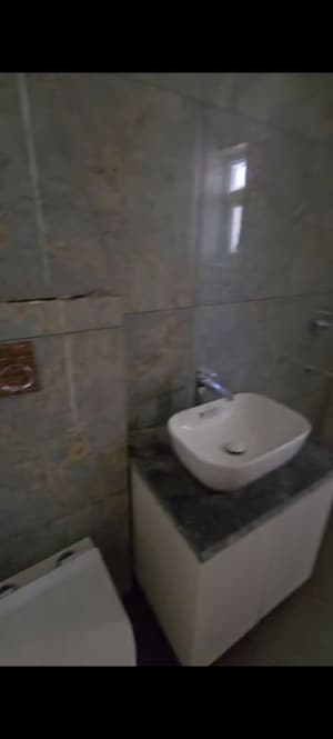 Bathroom in 3 BHK Apartment at Samridhi Luxuriya Avenue, Sector 150 – for Rent
