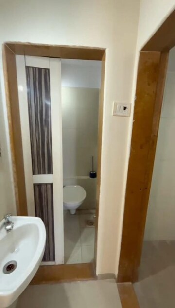 Bathroom in 1 BHK Apartment at Puranik Hometown Phase II, Ghodbunder Road – for Sale