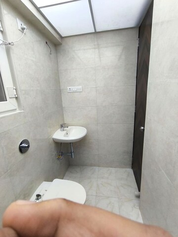 Bathroom in 1 BHK Apartment at Riddhi Rajendra Nagar Swagat CHS, Borivali East – for Rent