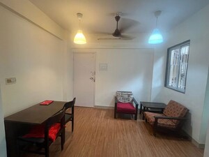 Living Room in 2 BHK Apartment at Ajay CHS Malad, Malad West – for Rent