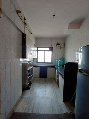 Kitchen in 2 BHK Apartment at Pratap Tower, Uthalsar – for Rent