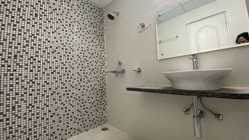 Bathroom in 2 BHK Apartment at Chandra Panorama, Sushant Golf City – for Rent