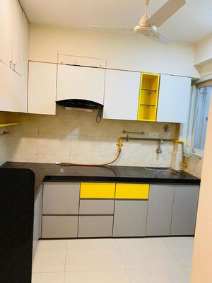 Kitchen in 2 BHK Apartment at Aashray Arise, Shilaj – for Rent