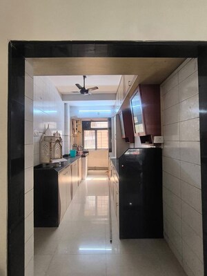 Kitchen in 2 BHK Apartment at Progressive Group Highness, Sanpada – for Rent