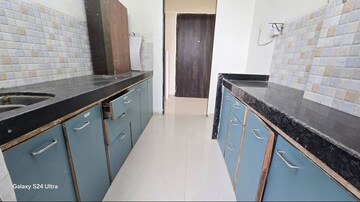 Kitchen in 2 BHK Apartment at Lotus Lotus Link Square, Malad West – for Rent