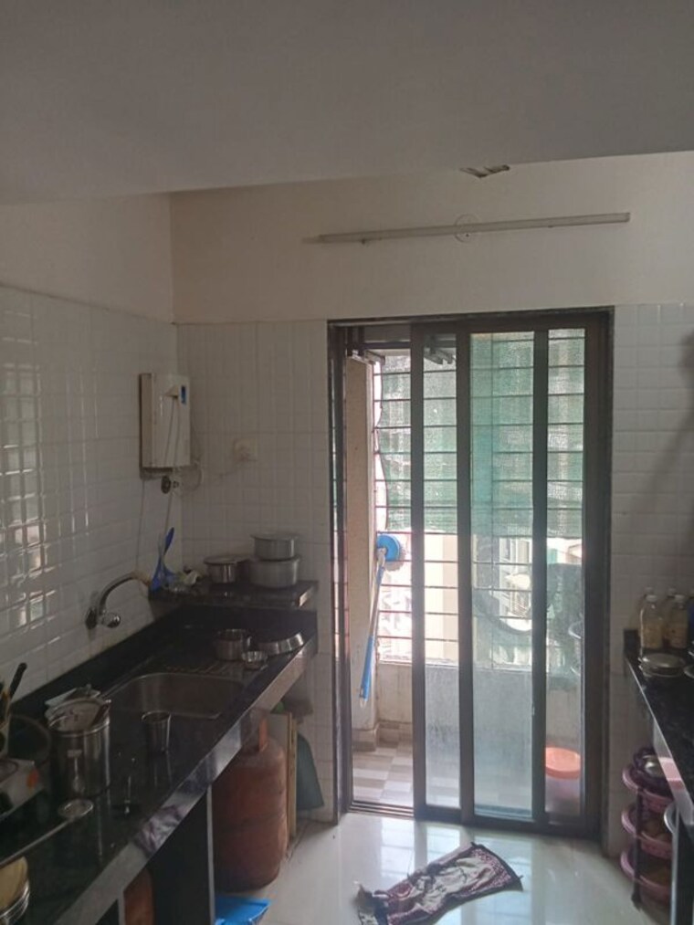 Kitchen, royal-residency-kalyan 2.5 Bedroom 810 Sq.Ft. Apartment In Kalyan West Thane 10070657