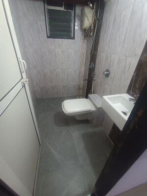Bathroom in 2 BHK Apartment at Lotus Lotus Link Square, Malad West – for Rent