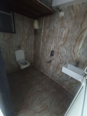Bathroom in 2 BHK Apartment at Lotus Lotus Link Square, Malad West – for Rent