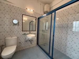 Bathroom in 4 BHK Apartment at Kemps Corner – for Rent