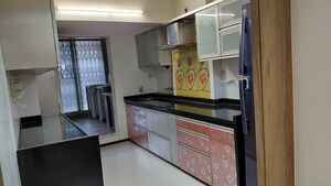 Kitchen in 2 BHK Apartment at Satellite Garden, Goregaon East – for Sale