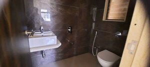 Bathroom in 1 BHK Apartment at Vardhman Grandeur, Andheri West – for Sale