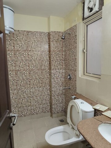 Bathroom in 3 BHK Builder Floor at Unitech Woodstock Floors, Sector 50 – for Rent