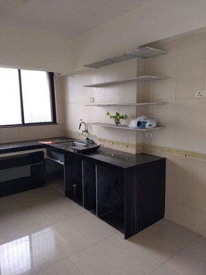 Kitchen in 1 BHK Apartment at Miraj Residency, Malad West – for Sale