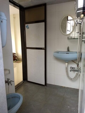 Bathroom in 1 BHK Apartment at Miraj Residency, Malad West – for Sale