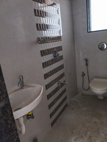 Bathroom in 1 BHK Apartment at Shraddha Vardaan, Bhandup West – for Rent