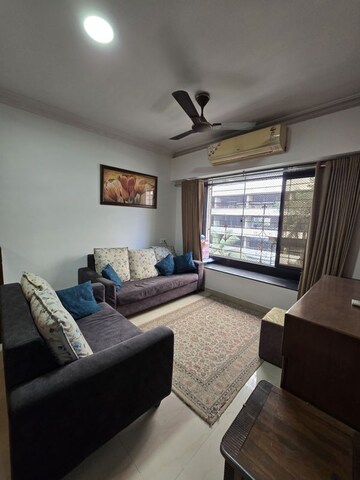 Living Room in 2 BHK Apartment at Maruti Darshan CHS, Mulund East – for Rent