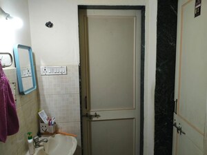 Bathroom in 1 BHK Apartment at G K Daffodils Housing Society, Pimple Saudagar – for Rent