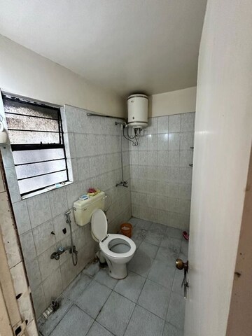 Bathroom in 2 BHK Apartment at Devi Lotus, Bopodi – for Rent