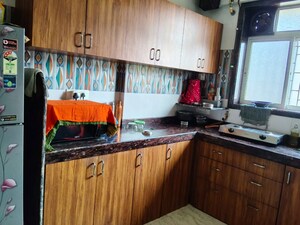 Kitchen in 2 BHK Apartment at Channal Classic Apartment, Kopar Khairane – for Rent