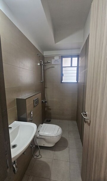 Bathroom in 2 BHK Apartment at Magarpatta Riverview City Hornbill Heights, Loni Kalbhor – for Sale