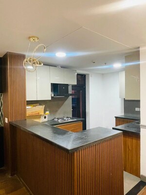 Kitchen in 3 BHK Apartment at Krisumi Waterfall Suites, Sector 36a – for Rent