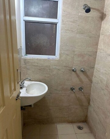 Bathroom in 1 BHK Apartment at Wave Dream Homes, Wave City – for Sale