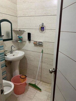 Bathroom in 3 BHK Builder Floor at Guru Nanak Enclave, Dhakoli – for Sale