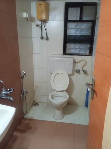 Bathroom in 1 BHK Apartment at Satellite Garden, Goregaon East – for Rent
