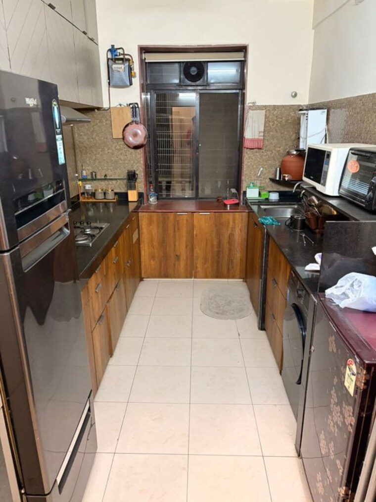 Kitchen, soni-house 2 Bedroom 800 Sq.Ft. Apartment In Juhu Mumbai 10085513