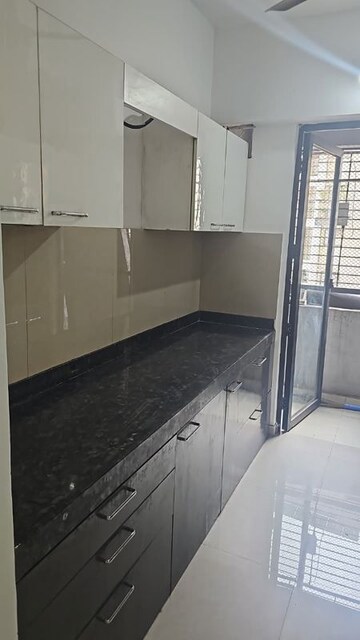 Kitchen in 2 BHK Apartment at Lodha Palava Downtown, Dombivli East – for Sale