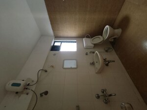 Bathroom in 2 BHK Apartment at Mittal Brothers Whistling Palms, Wakad – for Rent
