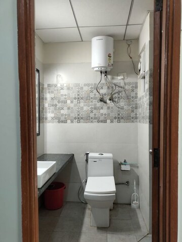 Bathroom in 1 BHK Apartment at Paramount Golfforeste, Zeta I Greater Noida – for Rent