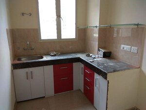 Kitchen in 2 BHK Apartment at AIG Park Avenue, Sector 4 Greater Noida – for Rent