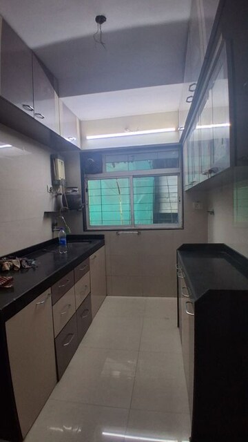 Kitchen in 1 BHK Apartment at Neev Galaxy, Malad East – for Rent