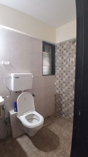 Bathroom in 1 BHK Apartment at Neev Galaxy, Malad East – for Rent