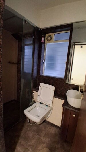 Bathroom in 1 BHK Apartment at Rizvi Cedar, Malad East – for Rent