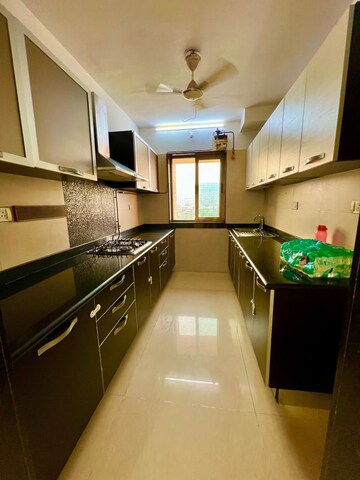 Kitchen in 2.5 BHK Apartment at Kalpataru Aura, Ghatkopar West – for Rent