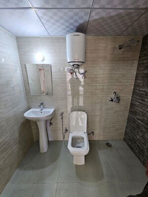 Bathroom in 2 BHK Apartment at SG Shikhar Height, Siddharth Vihar – for Rent