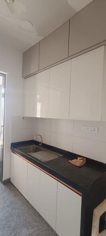 Kitchen in 1 BHK Apartment at Akshardham CHS, Malad West – for Rent