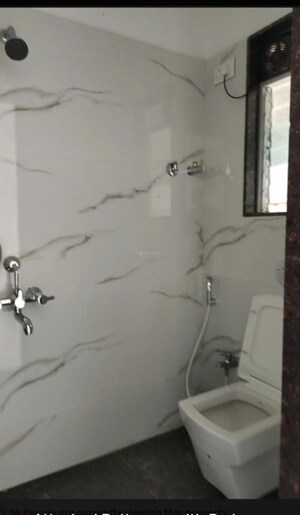 Bathroom in 1 BHK Apartment at Akshardham CHS, Malad West – for Rent