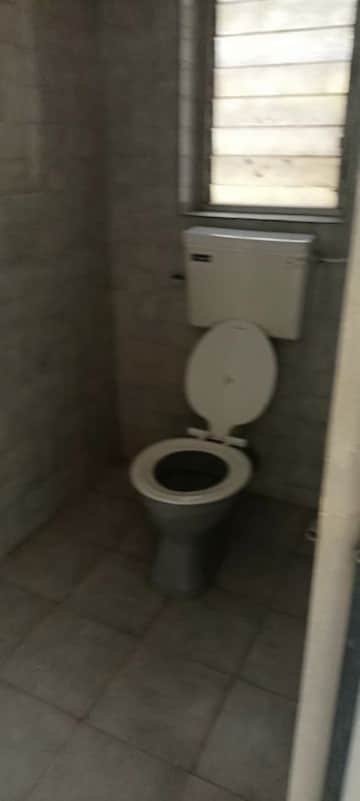 Bathroom in 1 BHK Apartment at Harshail Flamingo Apartments, Malad West – for Rent