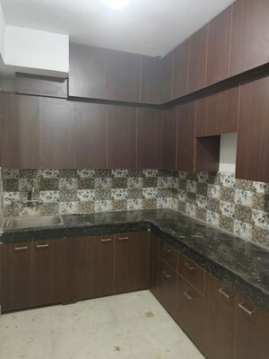 Kitchen in 1.5 BHK Apartment at Signature Global Synera, Sector 81 – for Rent
