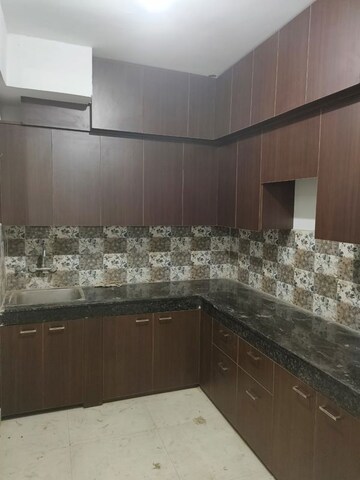 Kitchen in 1.5 BHK Apartment at Signature Global Synera, Sector 81 – for Rent
