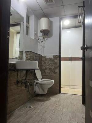 Bathroom in 3 BHK Apartment at Gaur Sportswood, Sector 79 – for Rent