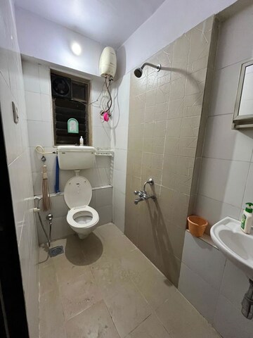 Bathroom in 2 BHK Apartment at Runwal Garden City, Balkum Pada – for Rent