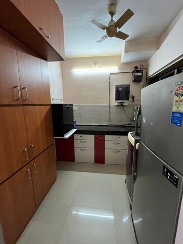 Kitchen in 2 BHK Apartment at Runwal Garden City, Balkum Pada – for Rent