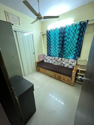 Living Room in 2 BHK Apartment at Runwal Garden City, Balkum Pada – for Rent