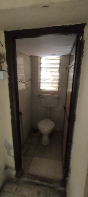 Bathroom in 1 BHK Apartment at Devrai CHS, Kandivali West – for Rent