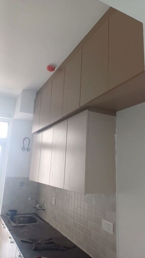 Kitchen in 3.5 BHK Apartment at ATS Homekraft Pious Orchards, Sector 150 – for Rent